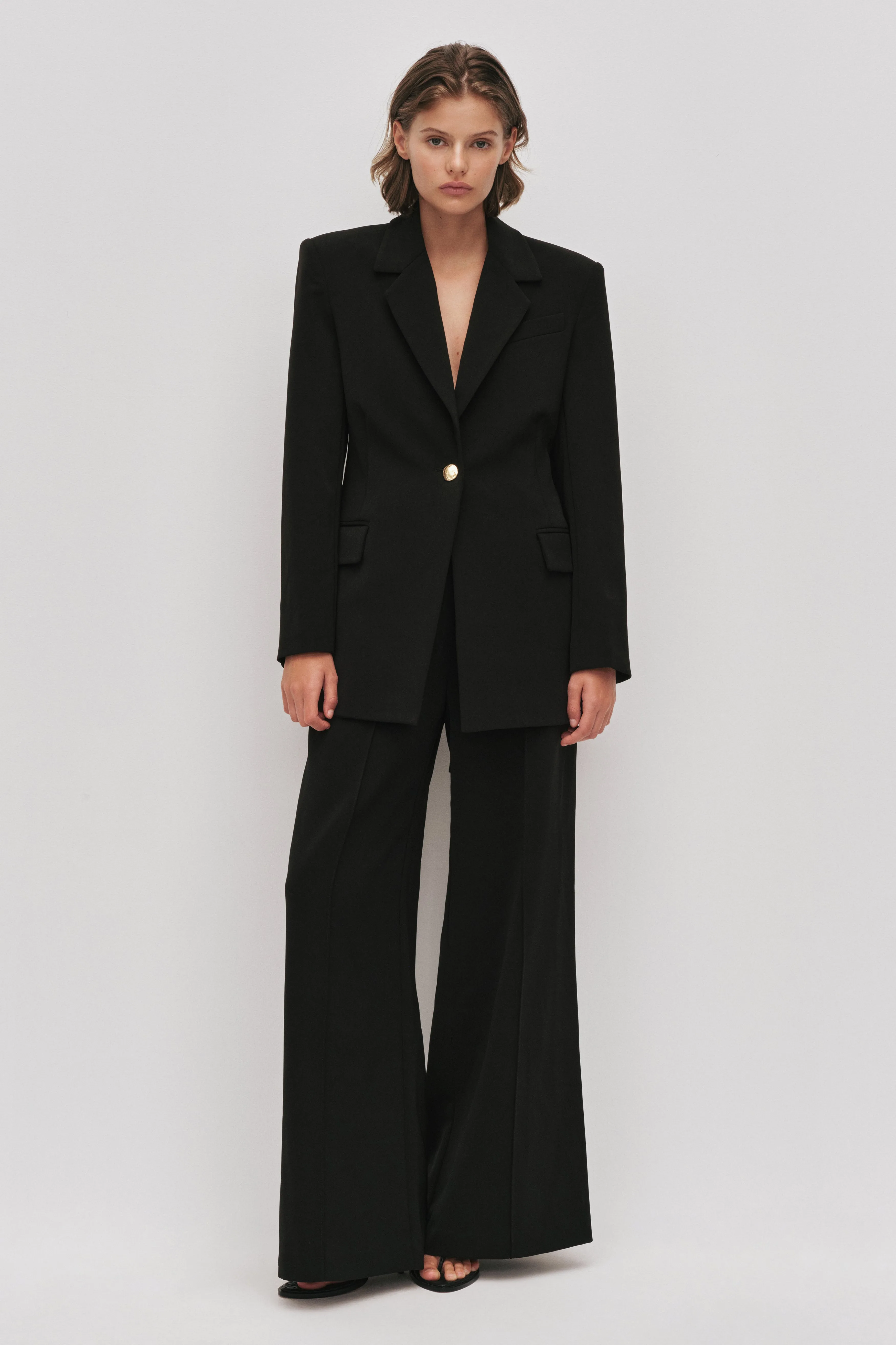 Symmetry Blazer sold by Aje