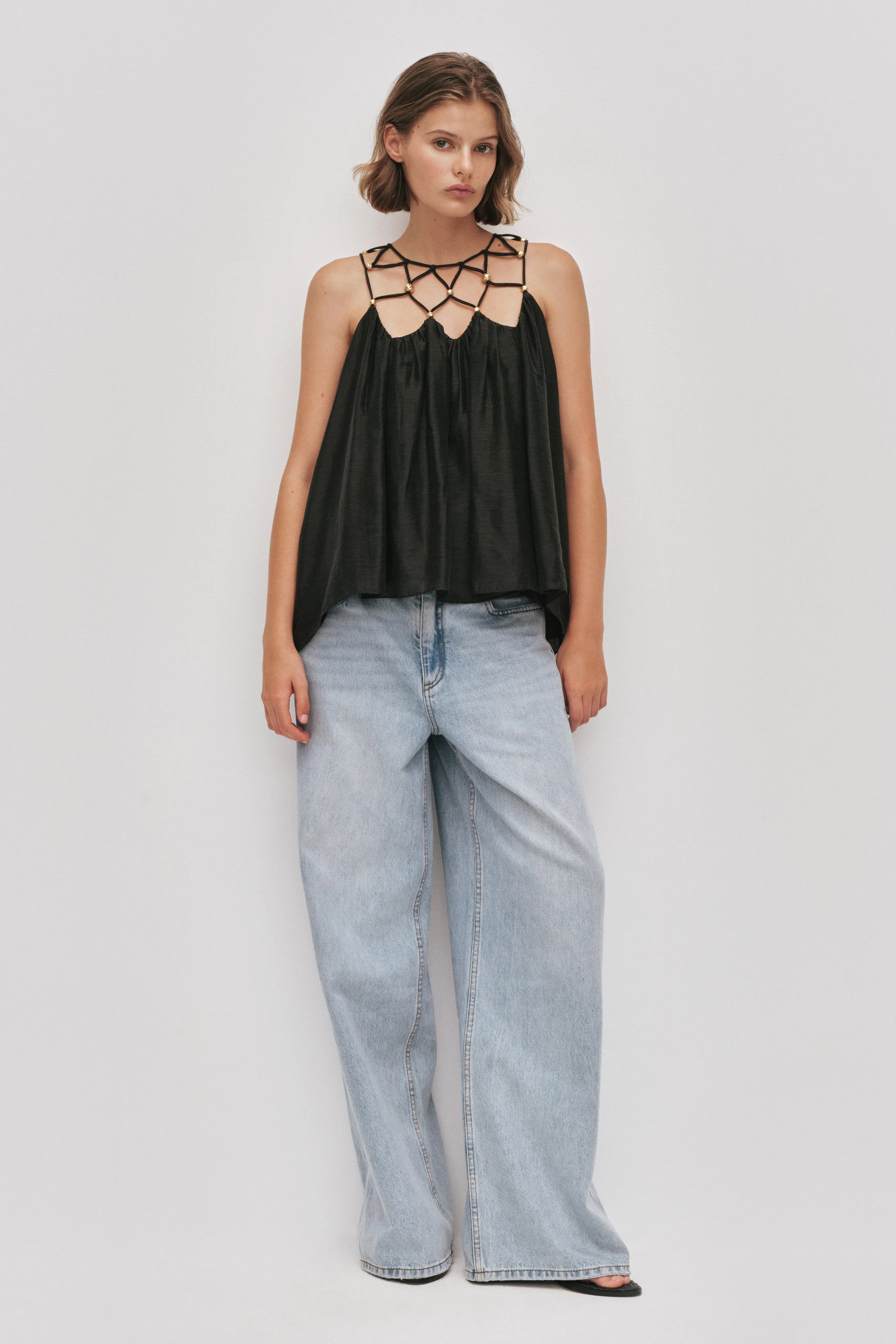 Della Beaded Top sold by Aje