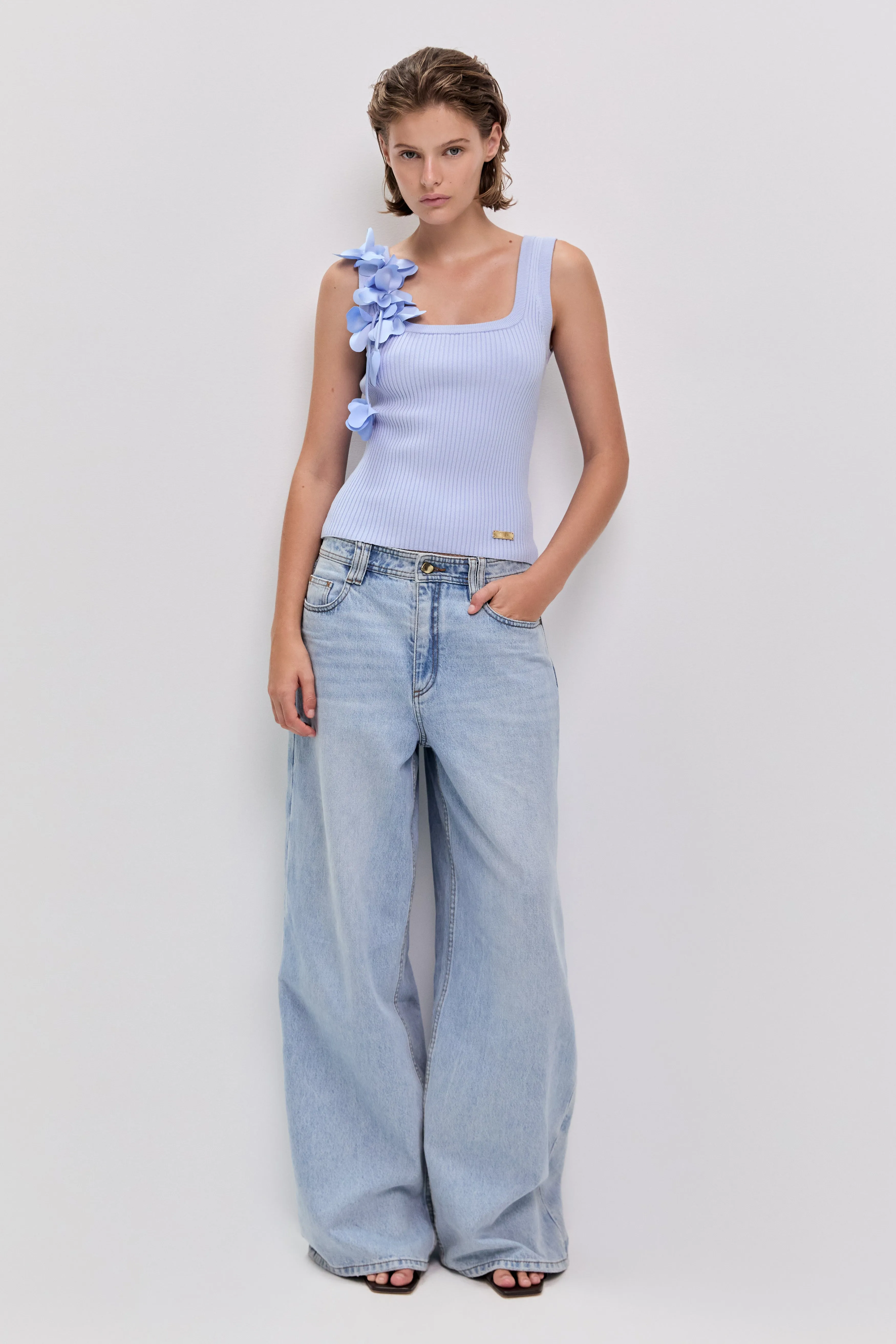 Camille Flower Tank sold by Aje