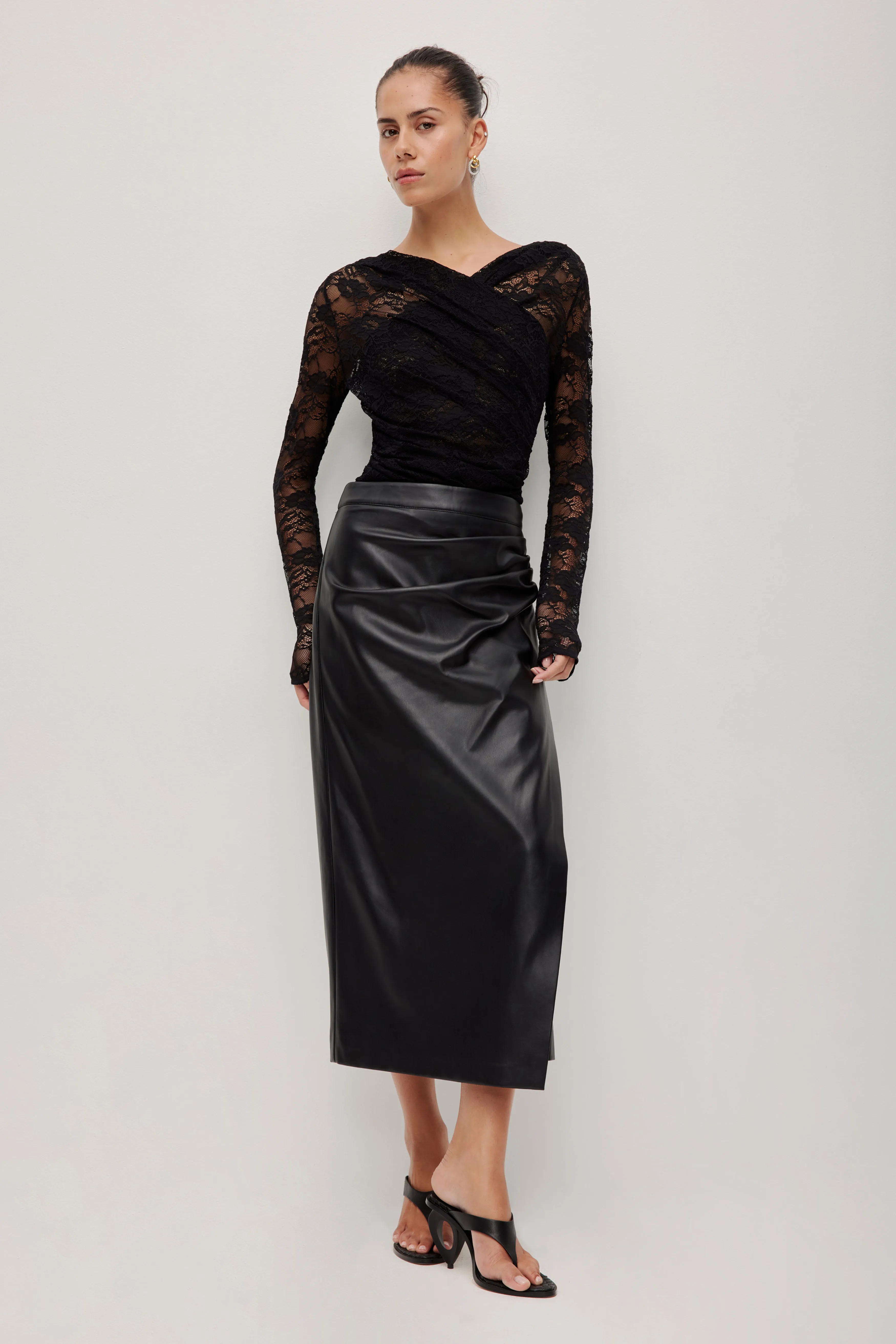 Saskia Midi Skirt sold by Aje