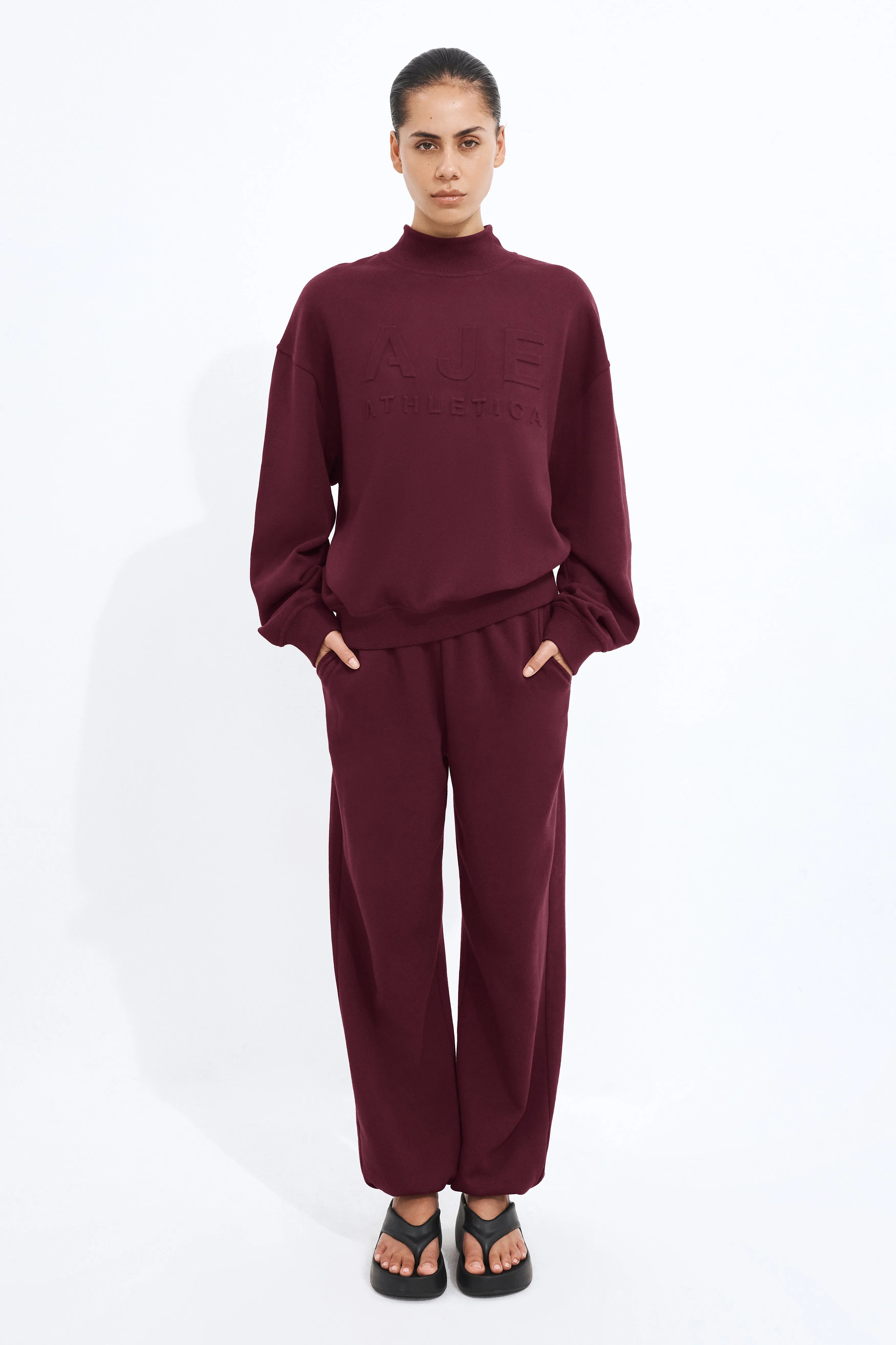 Cuffed Hem Logo Track Pants sold by Aje