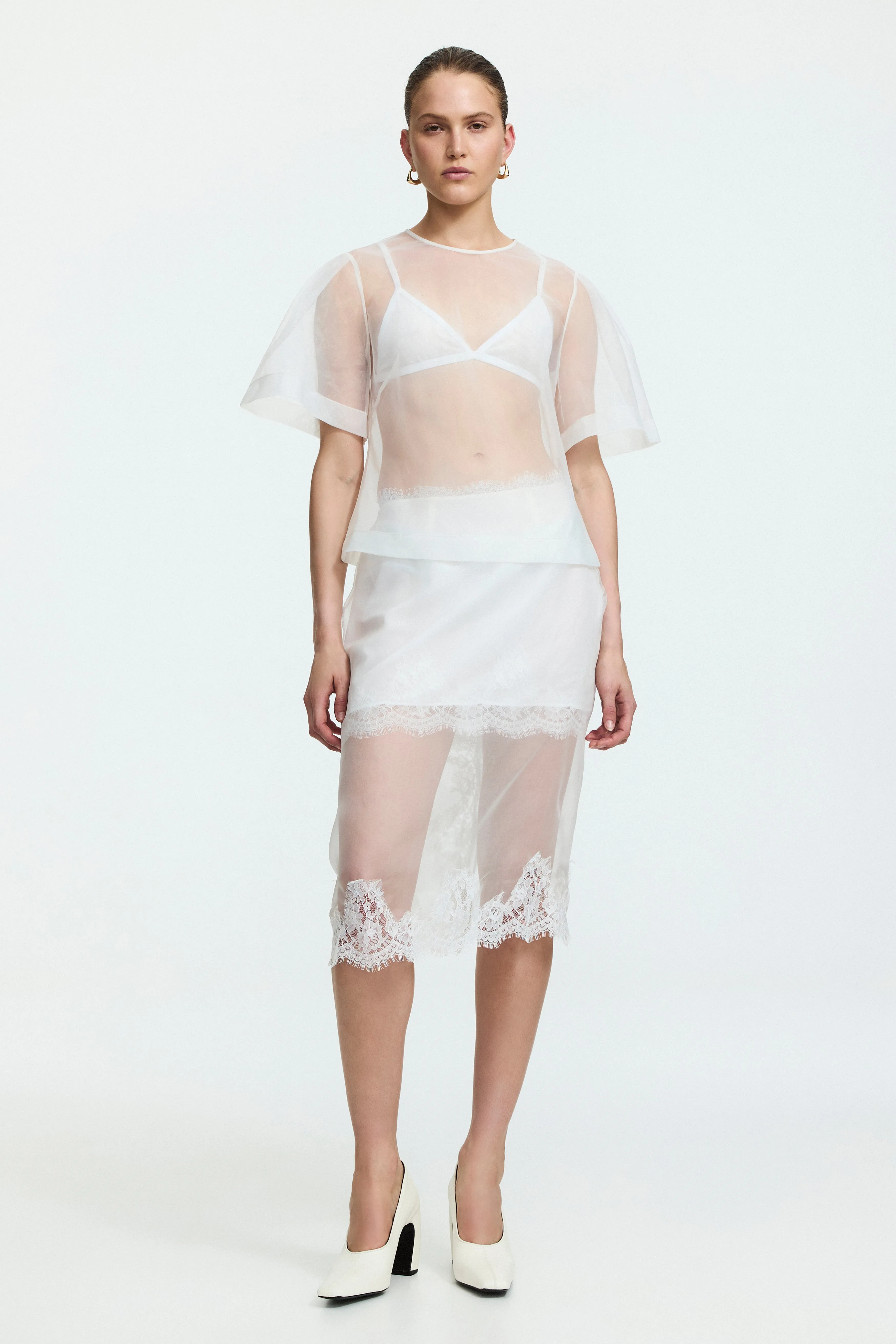 Hush Short Sleeve Top sold by Aje