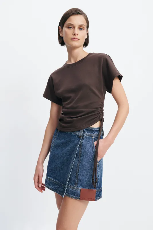 Olivia Denim Mini Skirt made by Aje