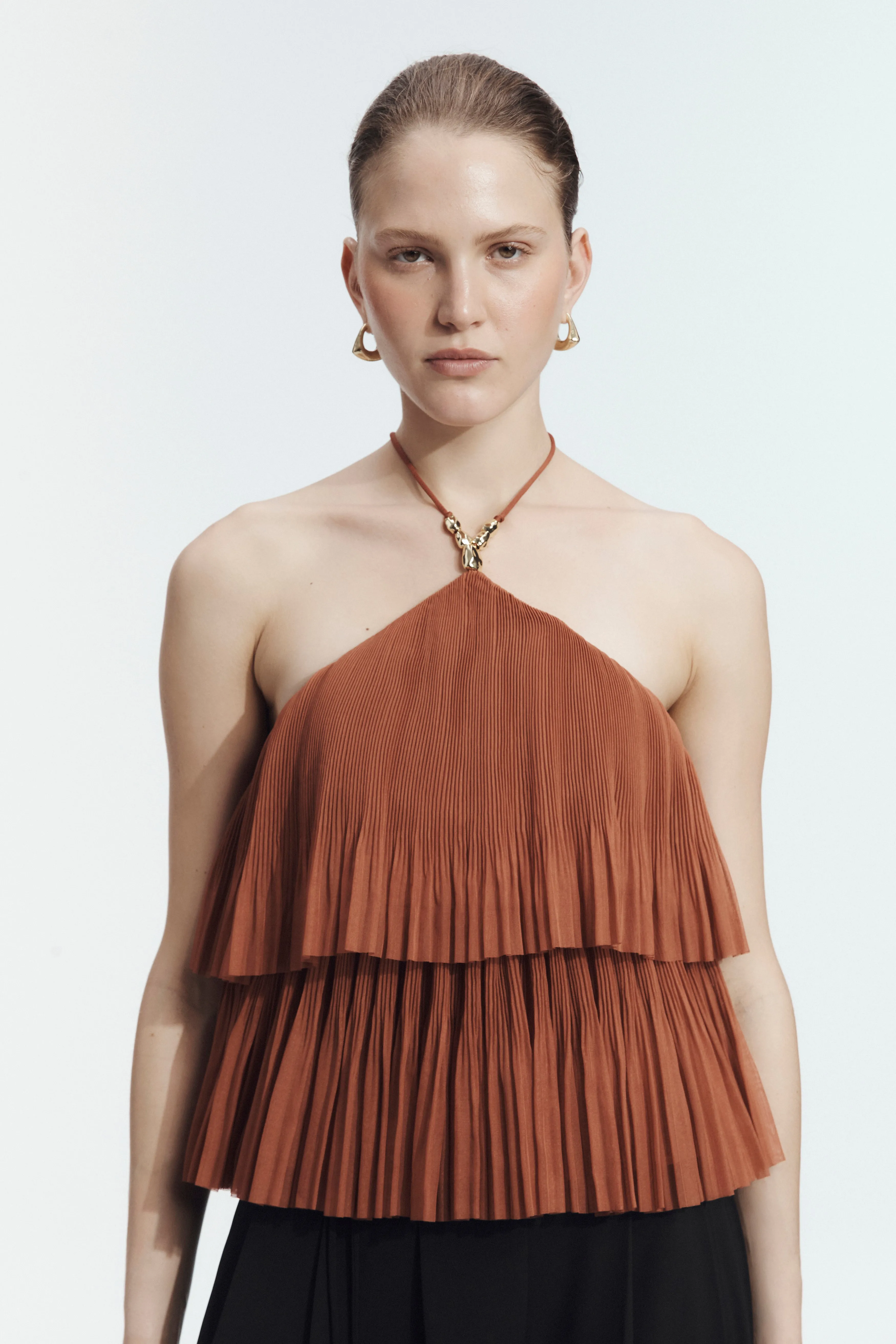 Aven Pleated Top sold by Aje