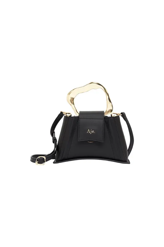 Thea Sculptural Handle Bag made by Aje