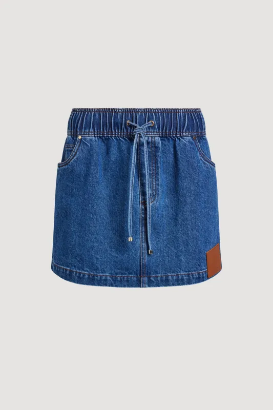 Flynn Denim Mini Skirt made by Aje
