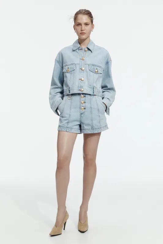 Joy Curved Back Denim Jacket made by Aje
