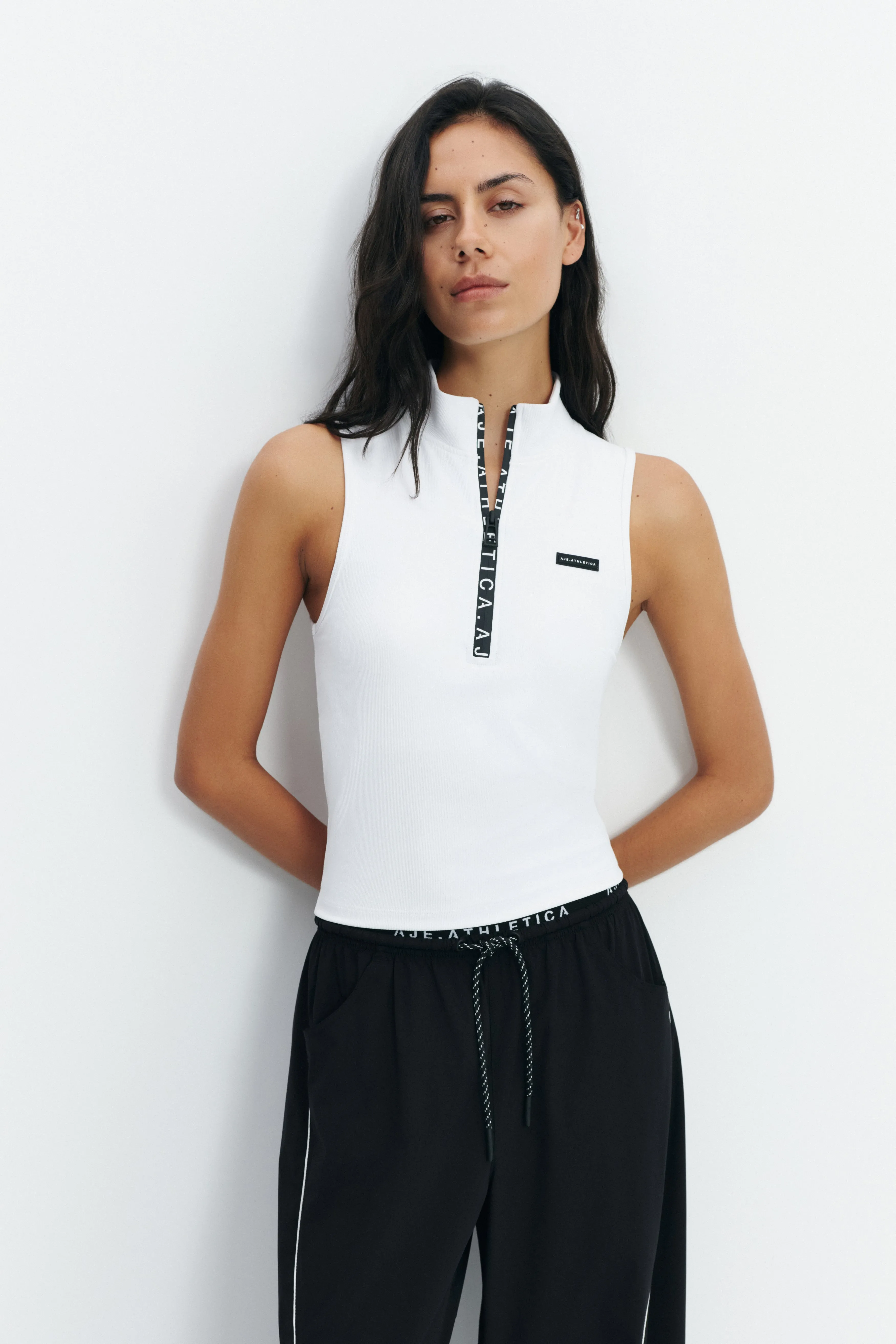 High Neck Zip Tank sold by Aje