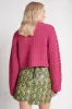 Serpentine Vegan Leather Mini Skirt sold by Aje