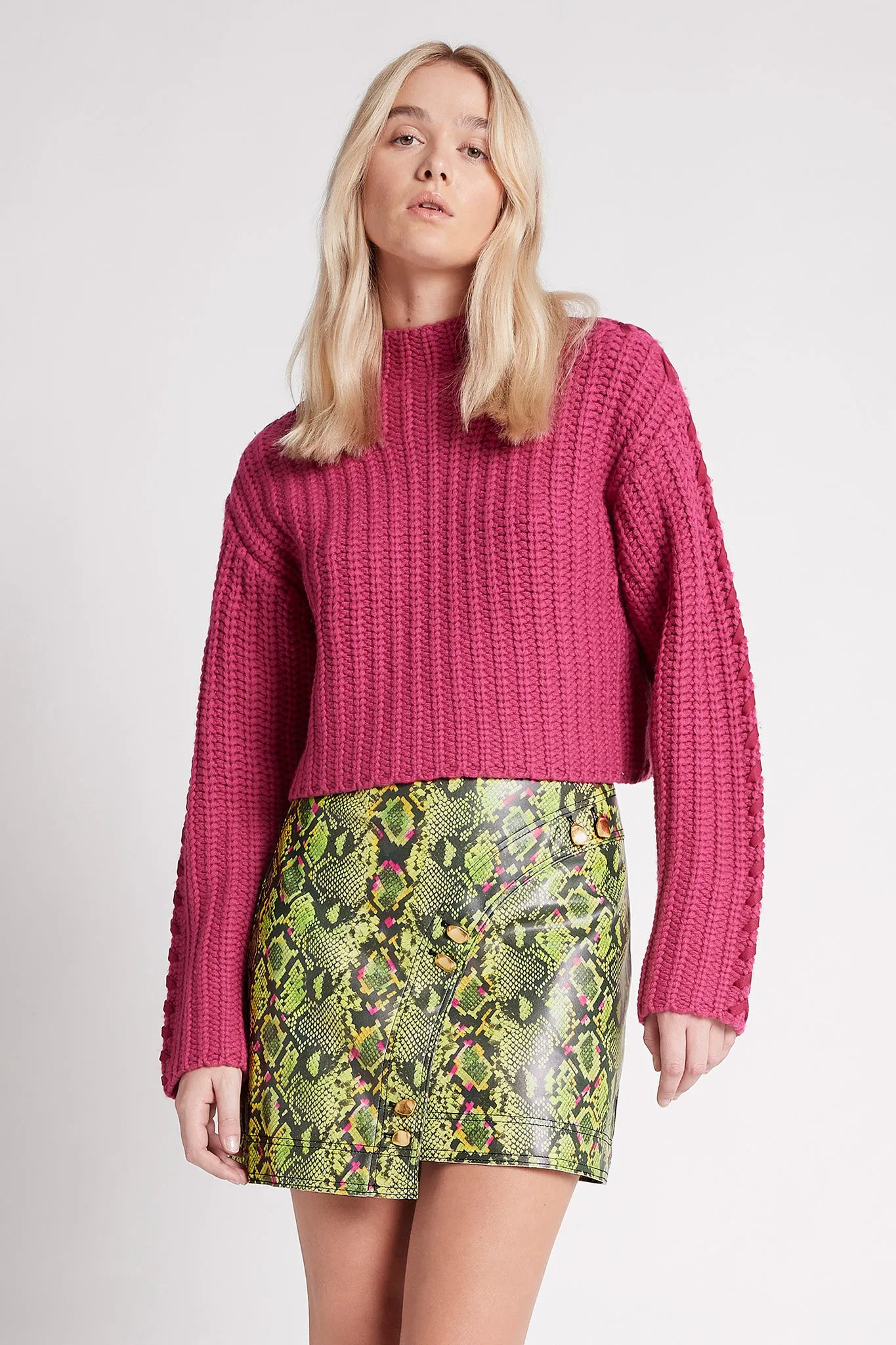 Serpentine Vegan Leather Mini Skirt sold by Aje