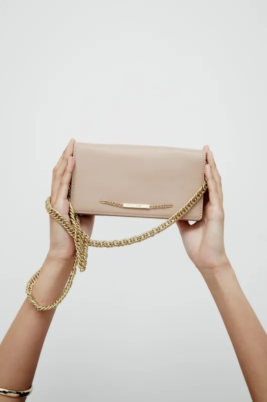 Almeida Chain Clutch sold by Aje