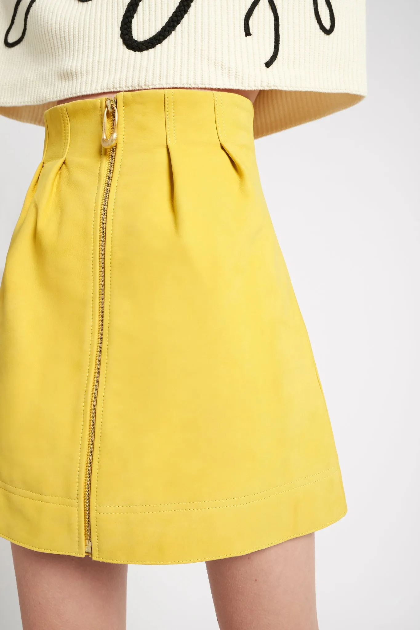 Camille Leather Tulip Mini Skirt sold by Aje