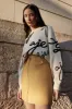 Camille Leather Tulip Mini Skirt sold by Aje