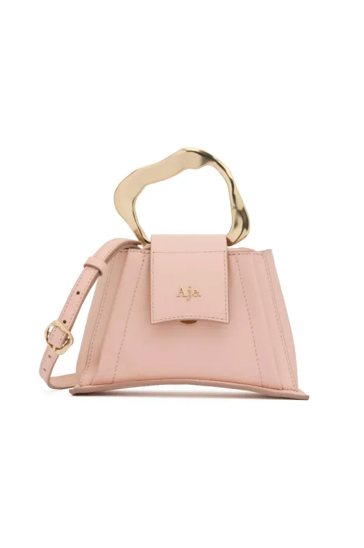 Thea Sculptural Handle Bag made by Aje