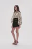 Realm Wrap Front Mini Skirt sold by Aje