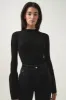 Flute Bell Sleeve Knit Top sold by Aje