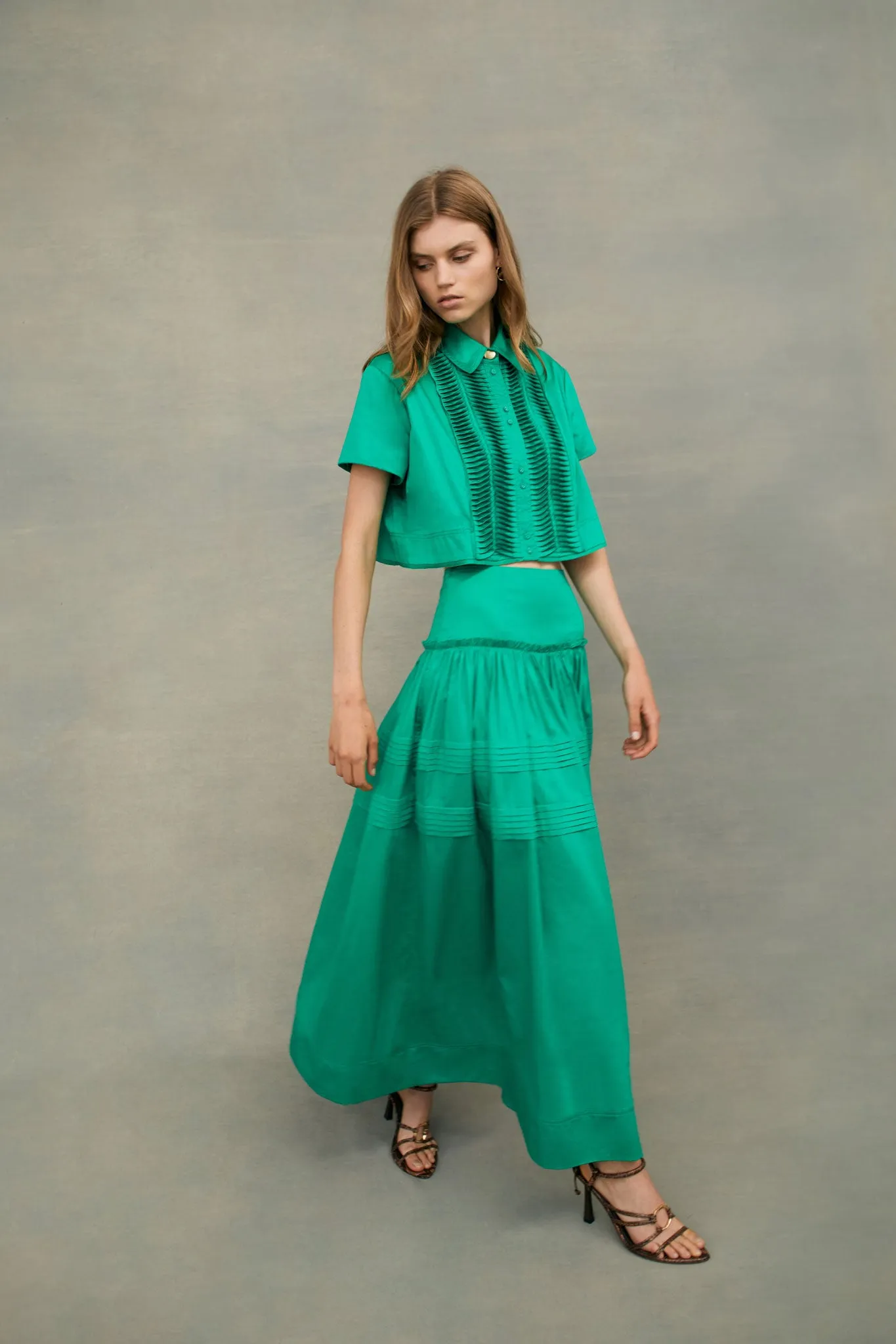 Poised Pleated Midi Skirt sold by Aje