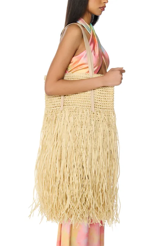 ST BARTZ SHAGGY STRAW TOTE BAG sold by AKIRA