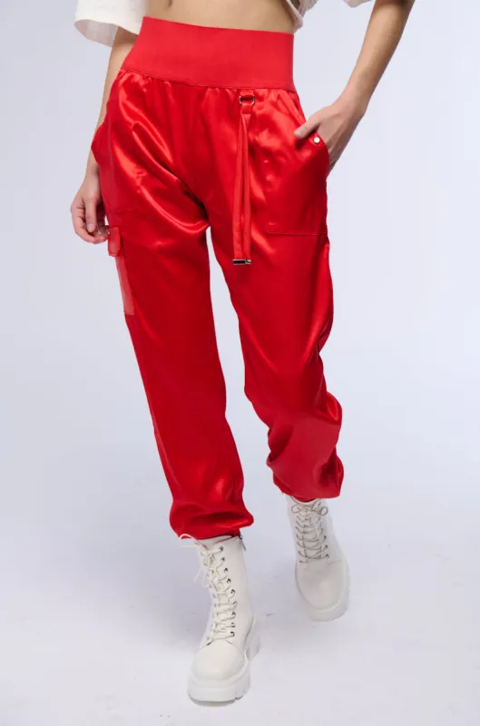 RICH GIRL ENERGY SATIN HIGH WAIST JOGGER PANT sold by AKIRA