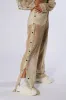 ALL THAT MESH WIDE LEG SNAP PANTS IN BEIGE sold by AKIRA