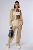 ALL THAT MESH WIDE LEG SNAP PANTS IN BEIGE sold by AKIRA