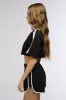 ON POINT BUTTON DOWN CROP TOP IN BLACK sold by AKIRA