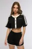 ON POINT BUTTON DOWN CROP TOP IN BLACK sold by AKIRA