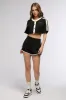 ON POINT BUTTON DOWN CROP TOP IN BLACK sold by AKIRA