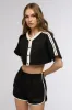 ON POINT BUTTON DOWN CROP TOP IN BLACK sold by AKIRA