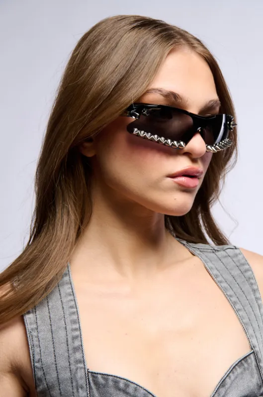 I BITE BACK STUDDED SUNGLASSES made by AKIRA
