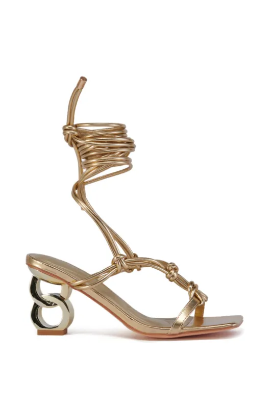 AZALEA WANG STUPENDOUS GOLD LINKING HEEL SANDAL sold by AKIRA