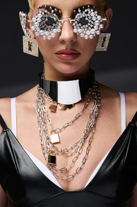 LOCKED IN LAYERED NECKLACE sold by AKIRA