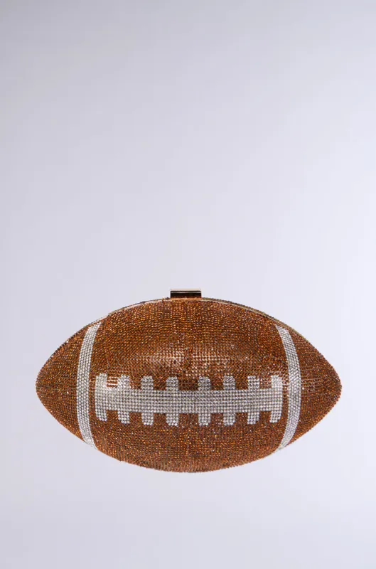 HALF TIME SHOW EMBELLISHED CLUTCH IN BROWN sold by AKIRA