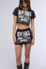 WHO CARES MINI SKIRT sold by AKIRA