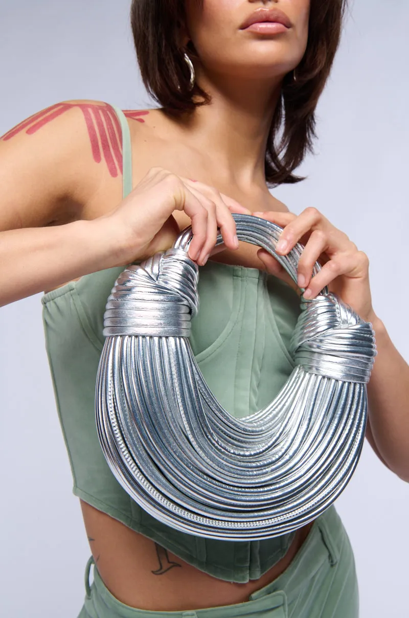 BRB FAUX LEATHER METALLIC ROPE PURSE IN SILVER sold by AKIRA