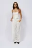 OVER THE TOP ELONGATED TANK IN WHITE sold by AKIRA
