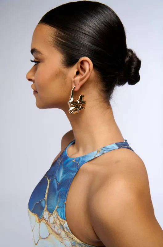 MELTING AWAY HOOP EARRING sold by AKIRA