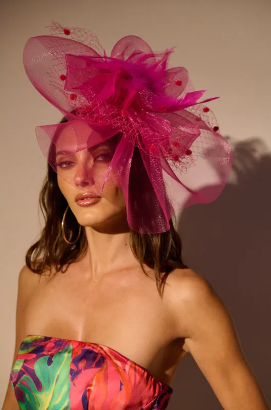 FUSCHIA FASCINATOR sold by AKIRA