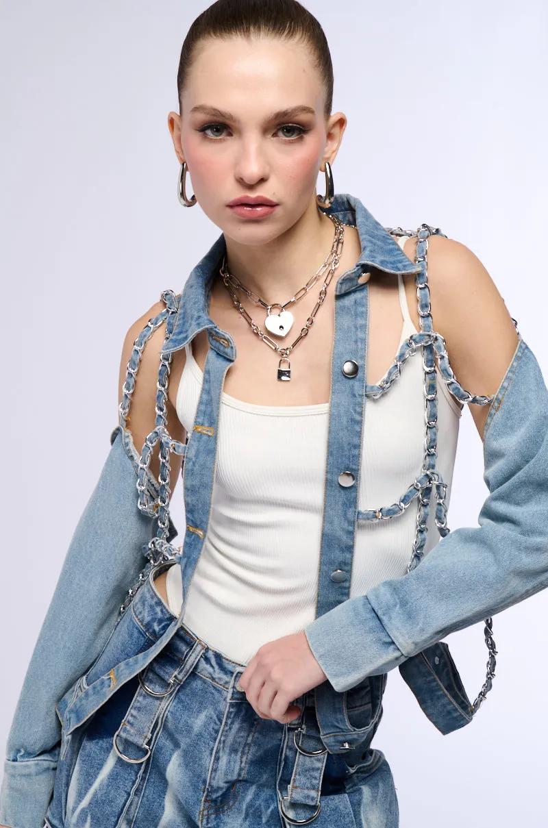 CAGED DENIM AND EXPOSED BODICE JACKET sold by AKIRA