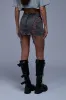 CALLIE LACE UP DENIM MINI SKIRT sold by AKIRA