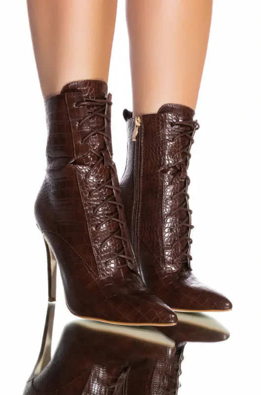 AZALEA WANG ASTORIA LACE UP STILETTO BOOTIE IN BLACKPATENT sold by AKIRA