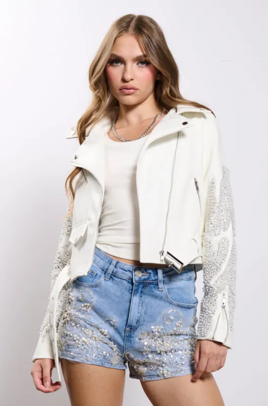 PEARL AND RHINESTONE SLEEVE FAUX LEATHER MOTO JACKET sold by AKIRA