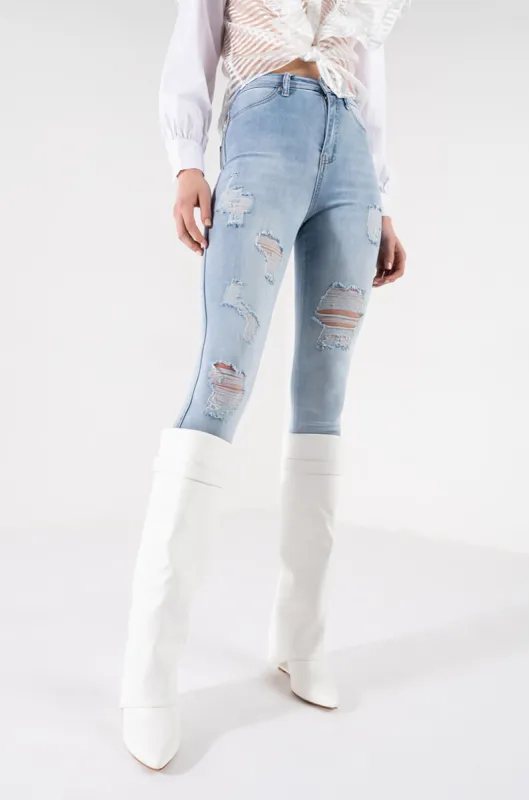 FLEX-FIT EXTREME STRETCH HIGH WAISTED DISTRESSED SKINNY JEANS sold by AKIRA