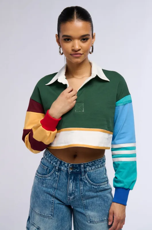VARSITY LETTER LONG SLEEVE CROPPED POLO SHIRT sold by AKIRA