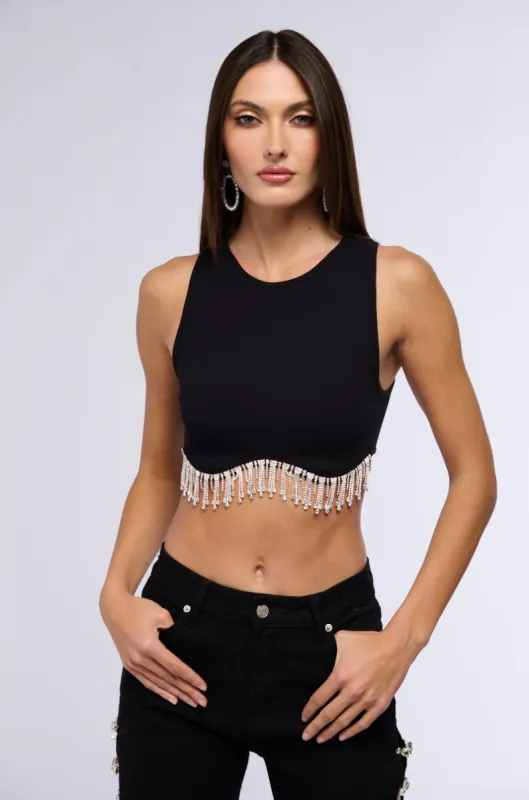 MAKE YOU BELIEVE IT RHINESTONE FRINGE TANK IN BLACK sold by AKIRA