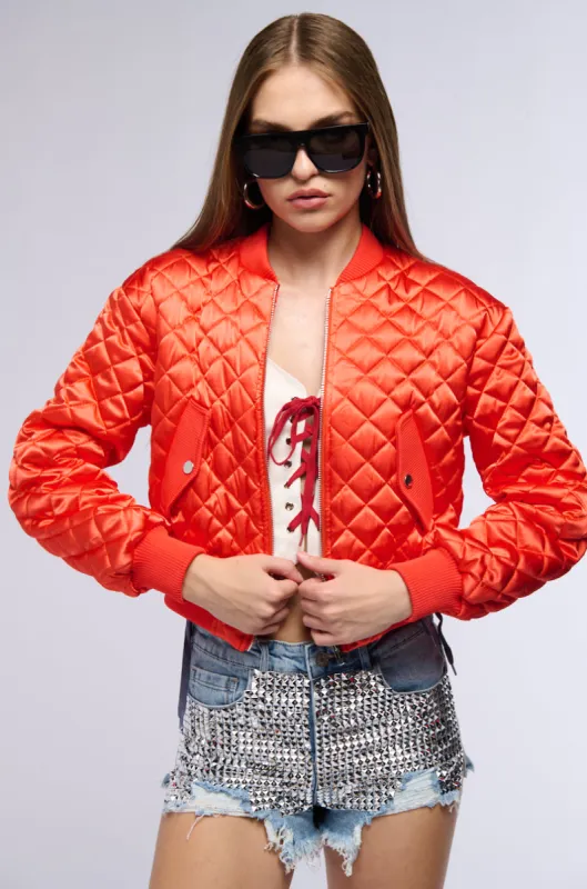 NEVER BETTER QUILTED SATIN BOMBER IN RED sold by AKIRA