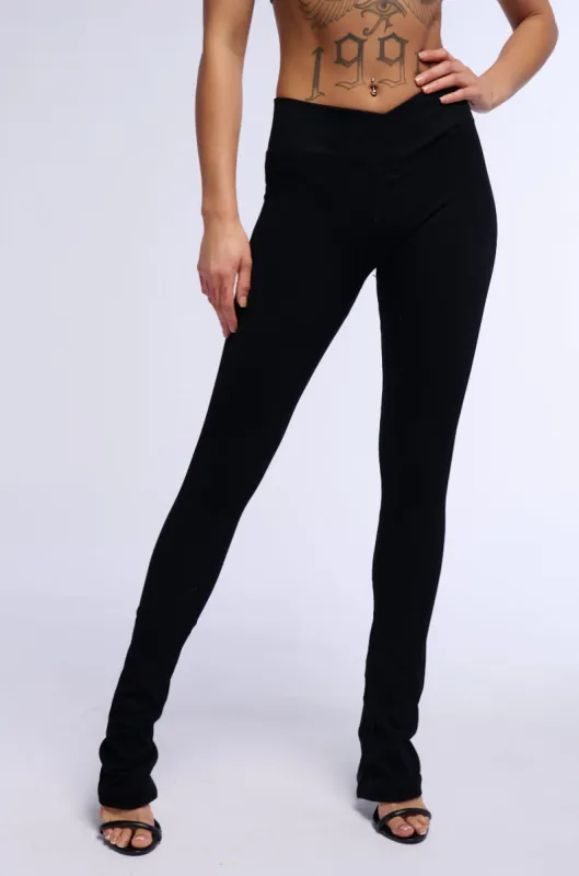 PAXTON RIBBED CROSS FRONT FLARED LEGGING IN BLACK sold by AKIRA