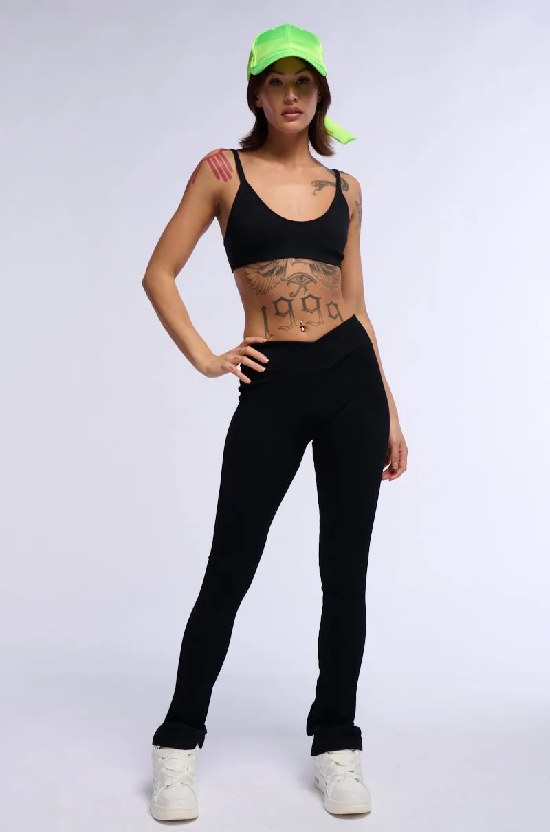 PAXTON RIBBED CROSS FRONT FLARED LEGGING IN BLACK sold by AKIRA product image thumbnail 5