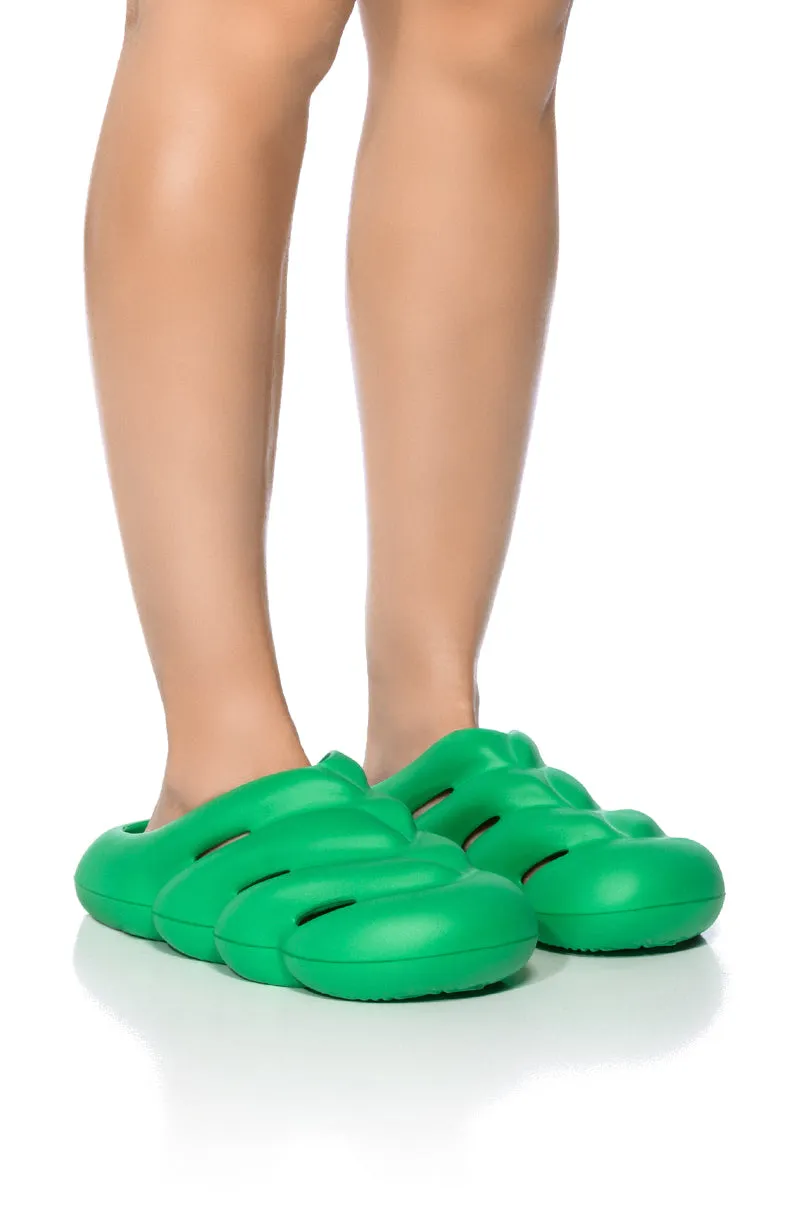 AZALEA WANG RUMBLE RUBBER FLAT SANDAL IN GREEN sold by AKIRA