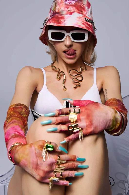 WINDING SNAKE STATEMENT NECKLACE sold by AKIRA